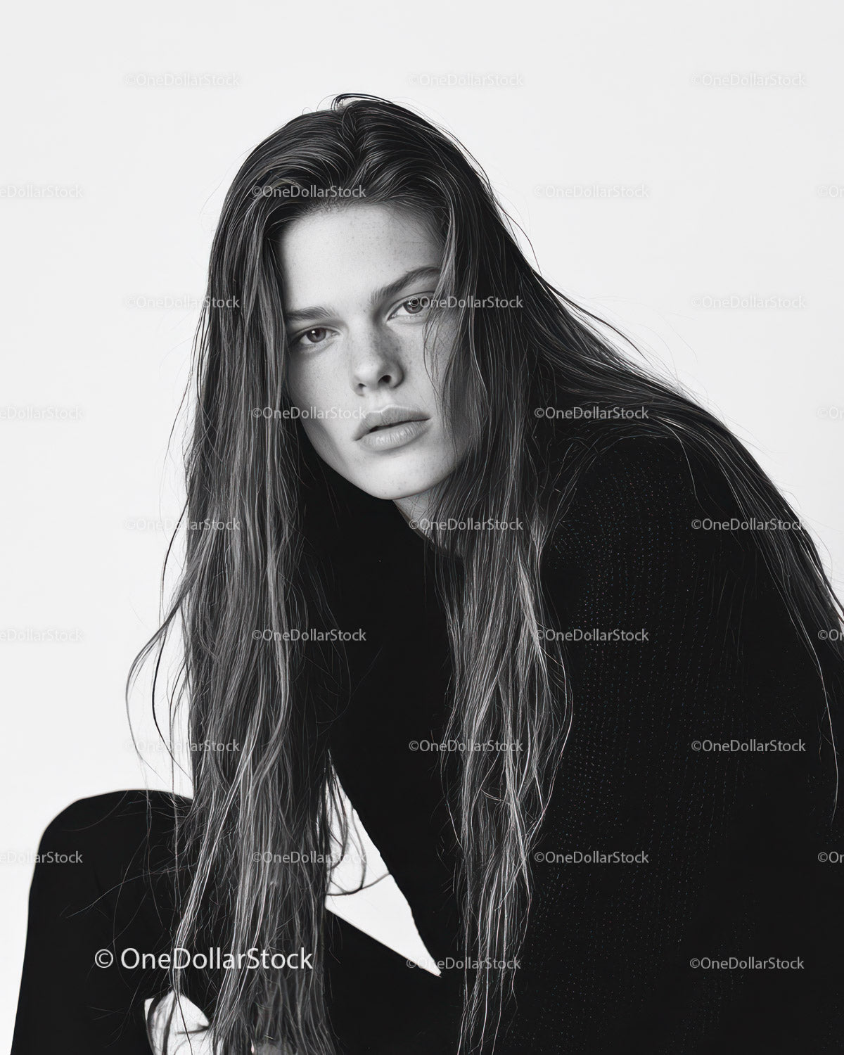 Black and White Portrait of Young Woman with Wet Hair and Intense Gaze