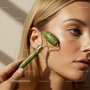 Close-Up of Woman Using Jade Roller for Facial Massage and Skin Rejuvenation