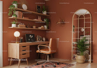 Cozy home office with warm terracotta walls and natural wood