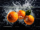 Fresh Juicy Oranges Splashing into Water in Vibrant Action