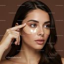 Young Woman Applying Under-Eye Patches for Skincare Treatment