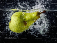 Fresh Green Pear Splashing into Water in High-Detail Action Shot