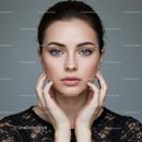 Elegant Portrait of a Woman with Bright Blue Eyes and Perfect Skin