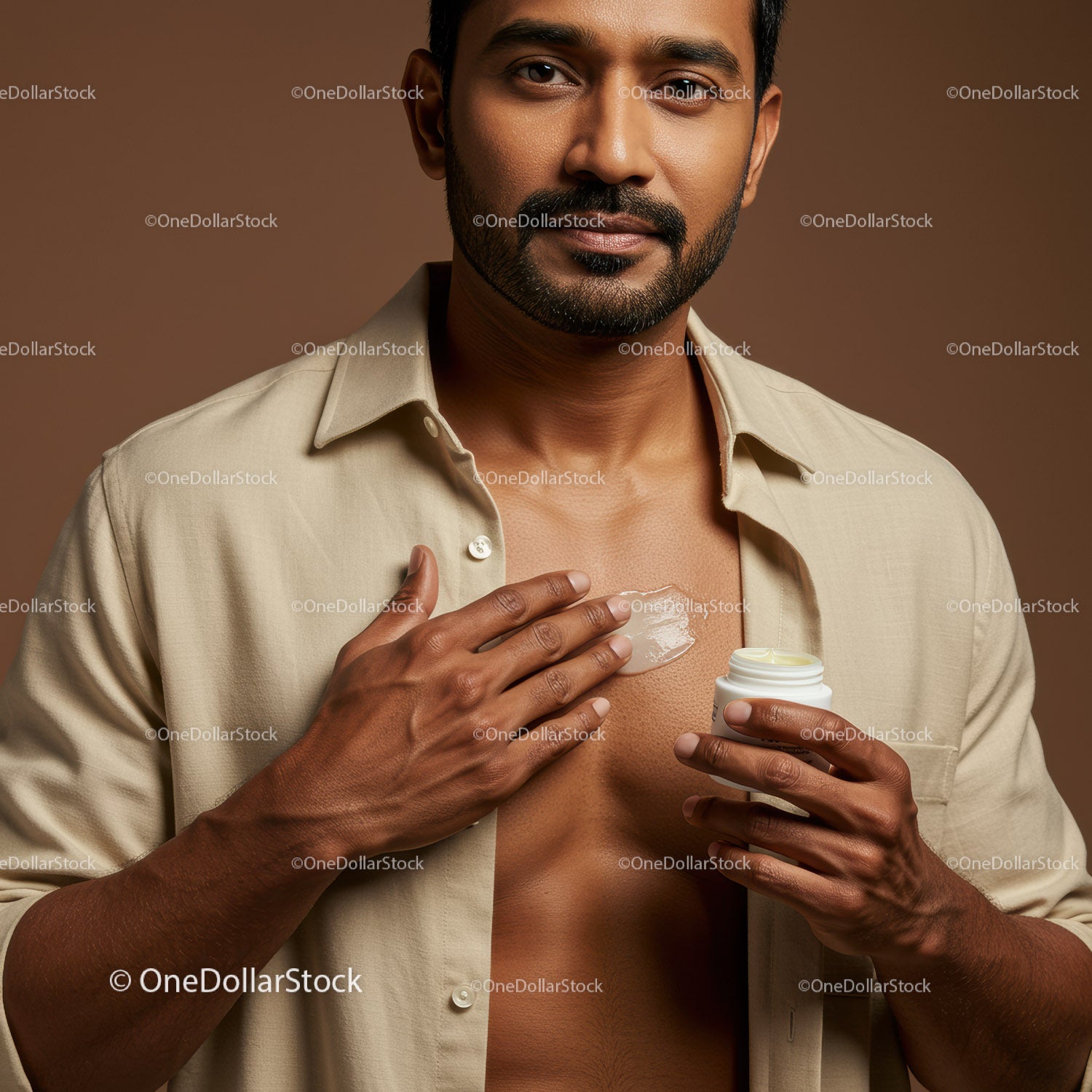 Handsome Man Applying Body Lotion for Smooth Skin and Moisturization