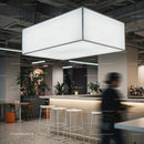 Modern coworking space with bright central light fixture