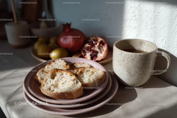 Rustic Breakfast Scene with Fresh Fruit and Coffee Mug