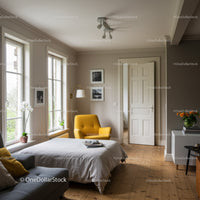 Bright and Cozy Bedroom with Yellow Armchair and Wooden Flooring
