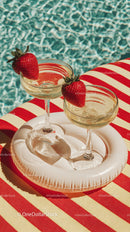 Strawberry Cocktails Under Poolside Sunlight with Striped Tablecloth