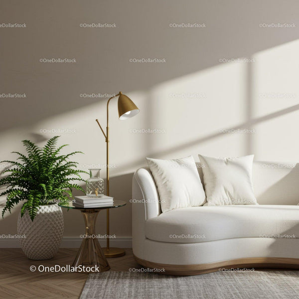 Cozy modern living room corner with white sofa and greenery