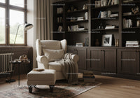 Cozy reading nook with beige armchair and dark bookshelves