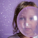 Child Peering Through Translucent Balloon with Sparkles