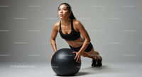 Young Athletic Woman Doing Push-Up with Exercise Ball in Gym