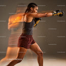 Focused boxer throwing punch in dynamic motion blur