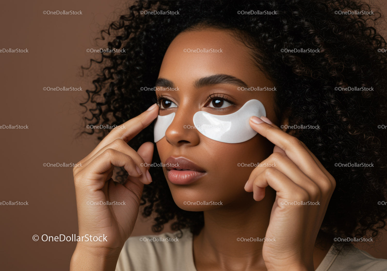 Close-up of Woman Applying Under Eye Patches for Skin Nourishment