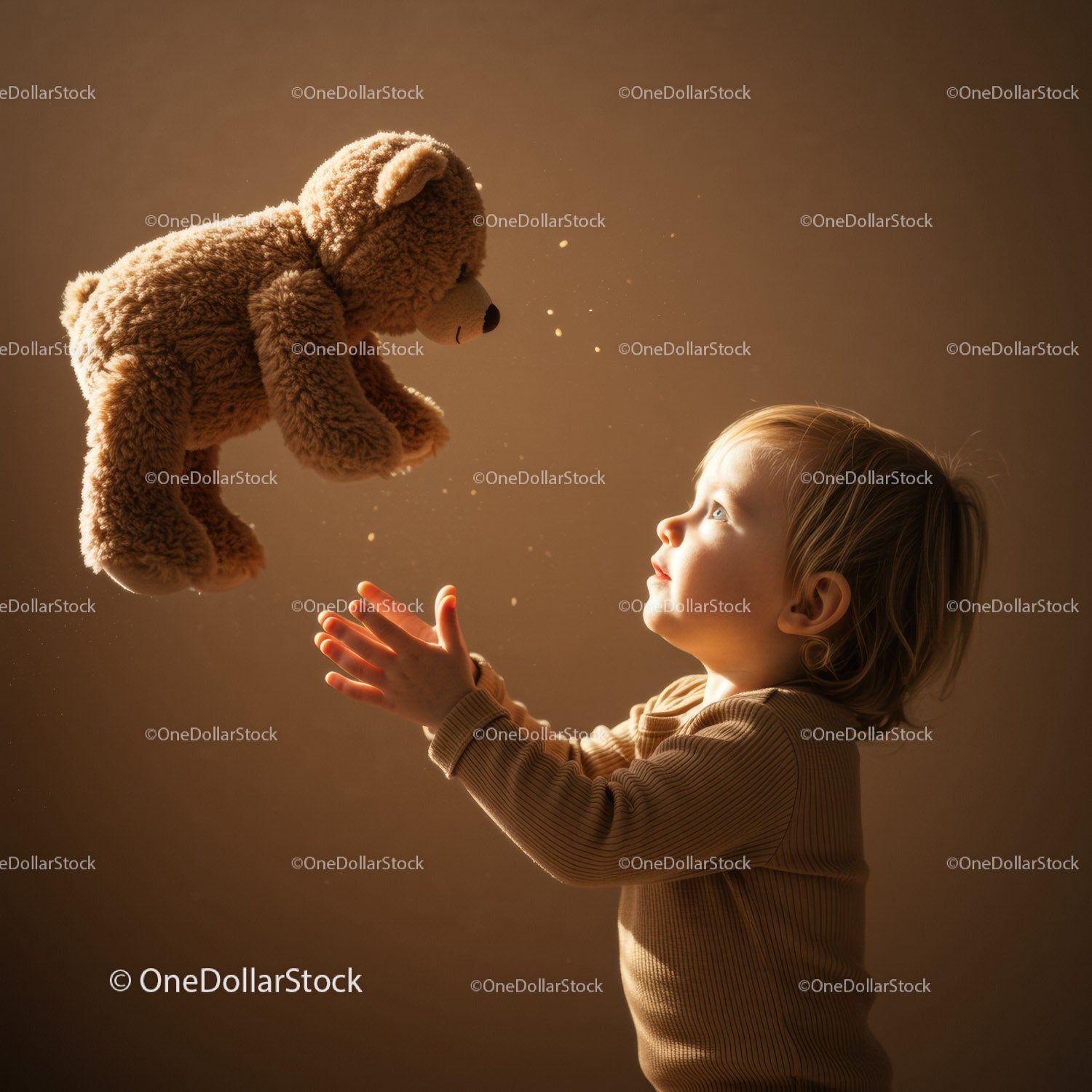 Toddler Reaching Out to Toss Fluffy Teddy Bear