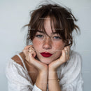 Young Woman with Freckles and Red Lipstick in Stylish Portrait