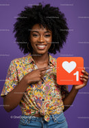 Vibrant Young Woman Holding Like Icon in Bright Casual Outfit