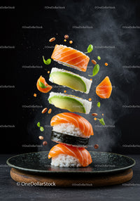 Floating Salmon and Avocado Sushi Pieces on Black Plate
