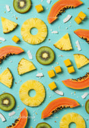 Assorted Tropical Fruit Slices on Blue Background