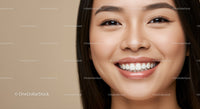 Close up of smiling young woman with flawless skin