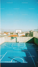 Urban Rooftop Basketball Court with Cityscape View