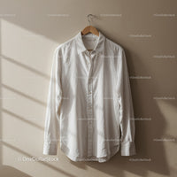Classic White Shirt Hanging on Wooden Hanger