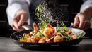 Fresh Shrimp and Vegetable Salad on Black Plate with Garnish