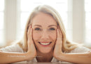 Joyful Woman Smiling with Blonde Hair in Bright Natural Light