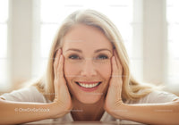 Joyful Woman Smiling with Blonde Hair in Bright Natural Light