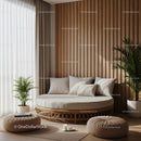 Cozy round daybed with cushions in sunlit living room
