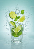 Refreshing lime and mint splash with ice cubes