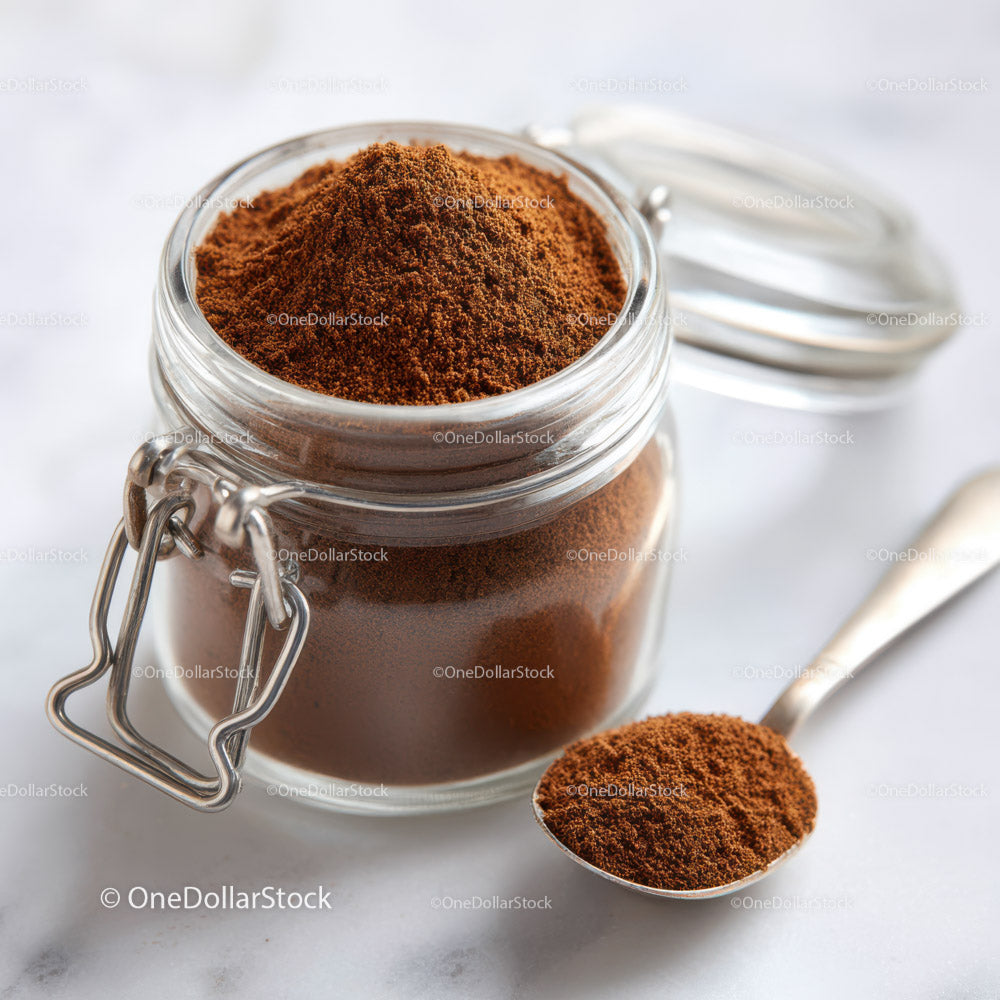 Glass Jar Filled with Fine Ground Coffee and Coffee Beans
