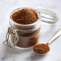Glass Jar Filled with Fine Ground Coffee and Coffee Beans
