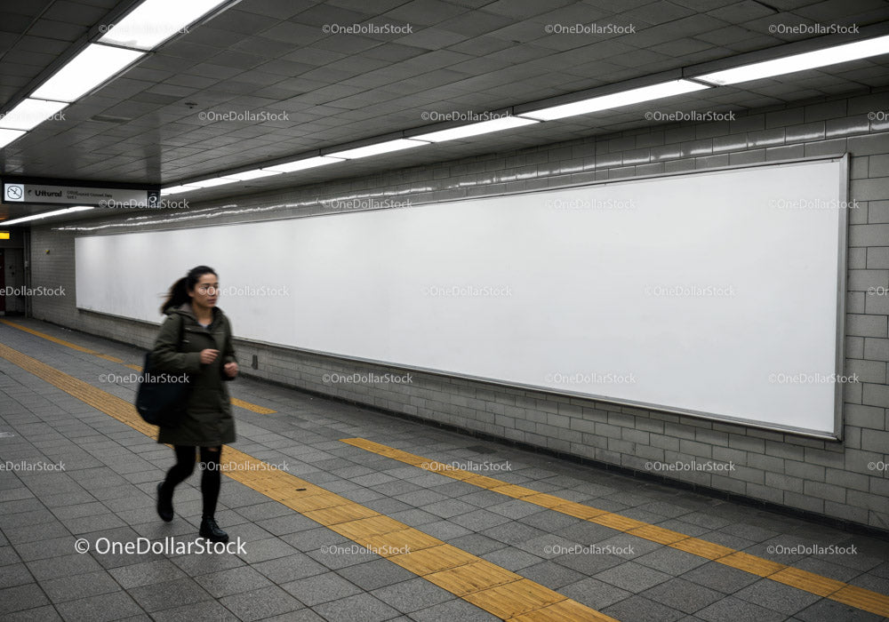 Minimalist Subway Tunnel with Tiled Walls and Modern Lighting