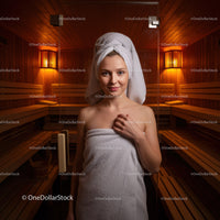 Relaxing Woman in Spa Sauna with Wooden Interior and Warm Lighting