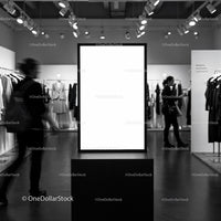 Minimalist fashion store with illuminated blank display