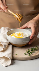 Close-Up of Honey Drizzling Over Creamy Yogurt in a Rustic Bowl