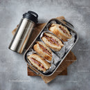 Delicious Ham and Cheese Sandwiches in Metal Lunchbox with Thermos