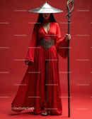 Elegant Woman in Red Dress with Accessories Against Red Background