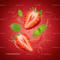 Fresh strawberry halves with mint leaves and water splash