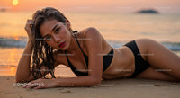 Beautiful Woman Lying on Beach During Stunning Sunset