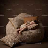 Peaceful toddler sleeping on cozy textured bean bag