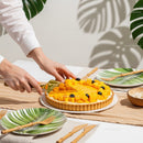 Fresh Mango Fruit Tart with Black Olives and Tropical Decoration