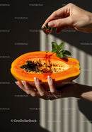 Fresh Papaya with Honey Drizzle and Mint Leaves