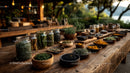 Herbal Spices in Glass Jars and Wooden Bowls on Rustic Table
