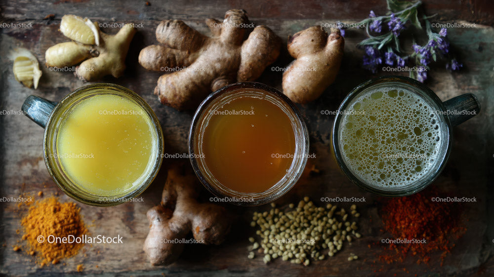 Variety of Herbal Drinks Featuring Fresh Ginger and Spices