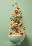 Healthy granola and dried fruit bowl on green background