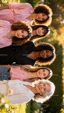 Multi-Generational Women Embracing Natural Beauty Outdoors
