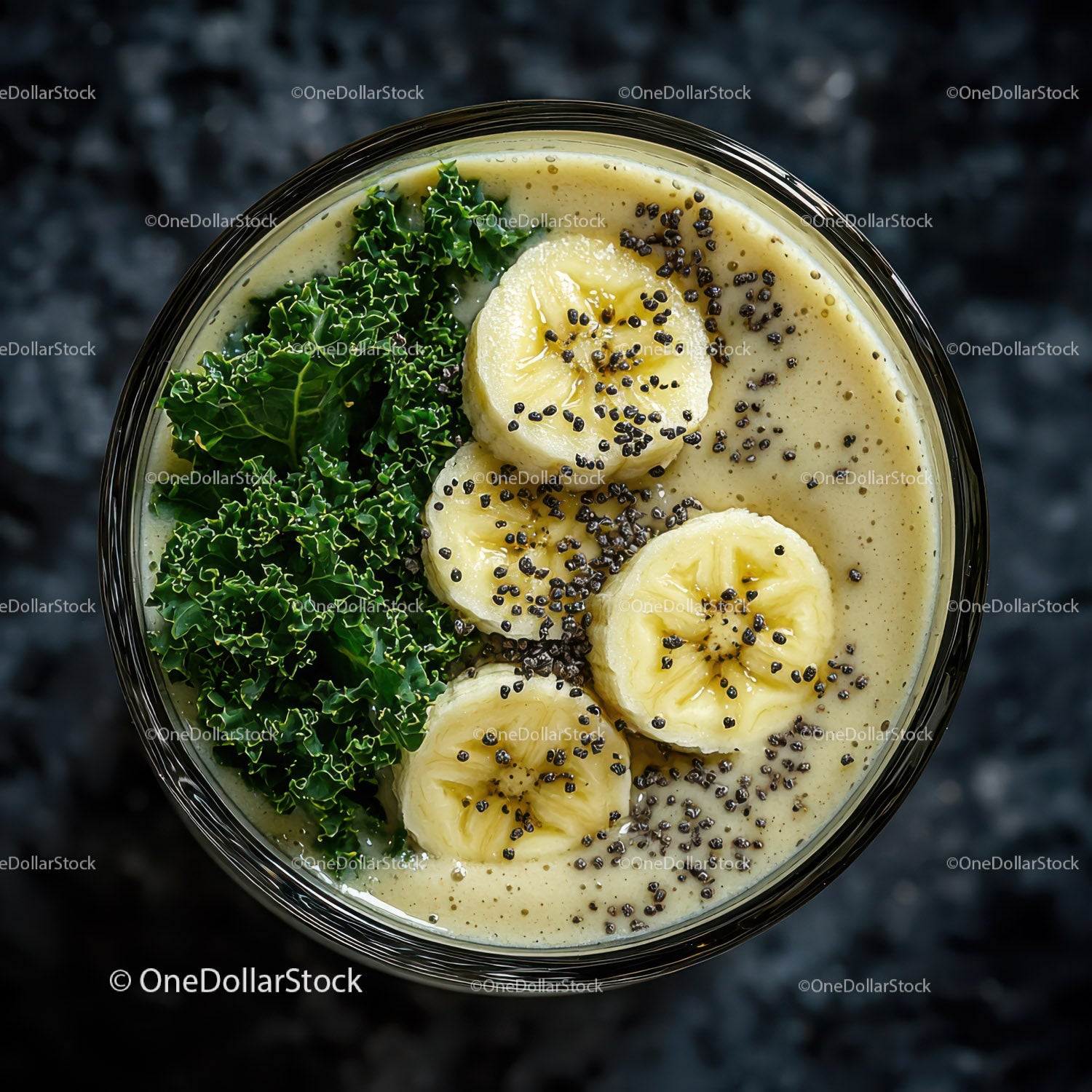 Banana Slices and Kale in Creamy Smoothie Bowl with Chia Seeds