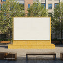 Urban public square with large blank stone billboard